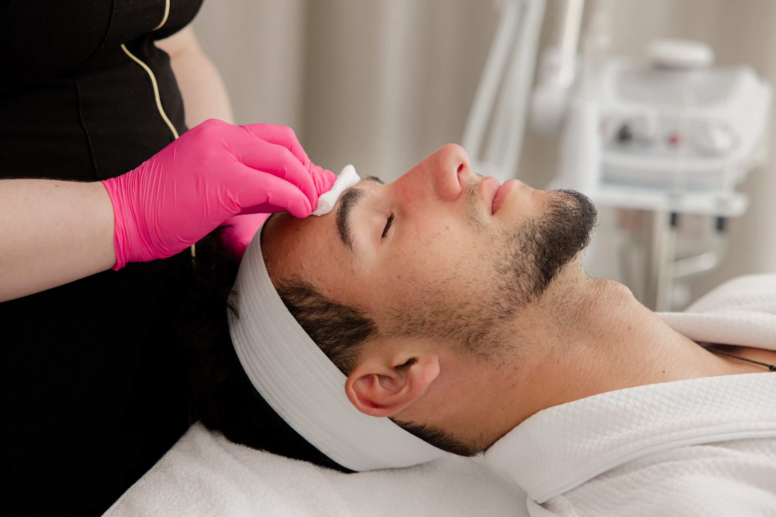 Man getting facial treatment