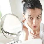 Greenwich Medical Spa consultation for choosing between Botox, filler, and collagen stimulation treatment for facial aging, including wrinkles and volume loss.